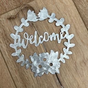 METAL hanging “welcome” sign
